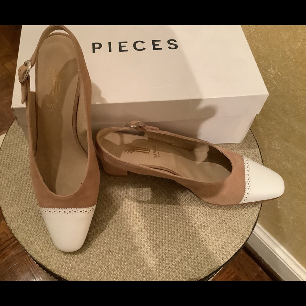 Leather and suede sling back shoes.